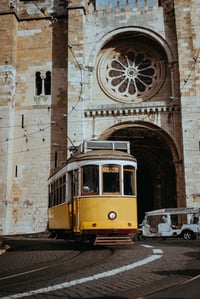 quaint-yellow-tram-passes-directly-in-front-of-the-2026-03-10-01-07-17-utc (1)